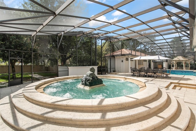 view of pool featuring a lanai, a patio area, and a fenced in pool