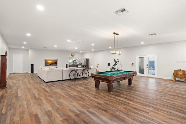 rec room featuring recessed lighting, visible vents, wood finished floors, and french doors