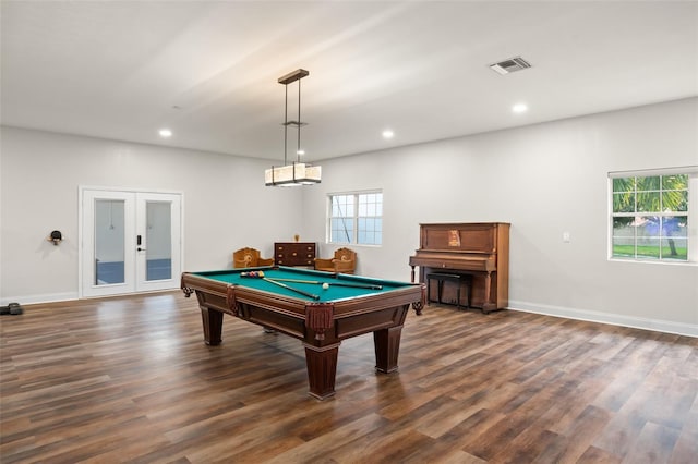 playroom with visible vents, dark wood-type flooring, and french doors