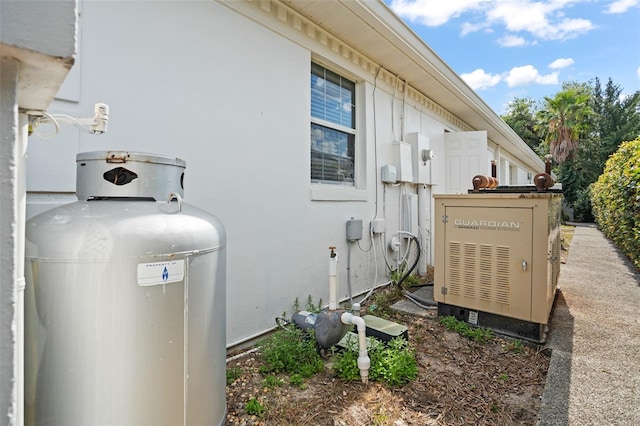 view of side of home featuring stucco siding