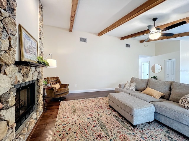 living room with dark wood-style floors, a fireplace, visible vents, and baseboards