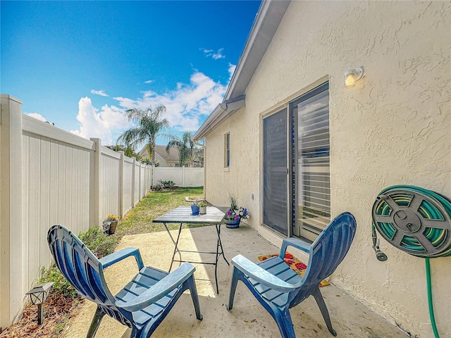 view of patio / terrace with a fenced backyard