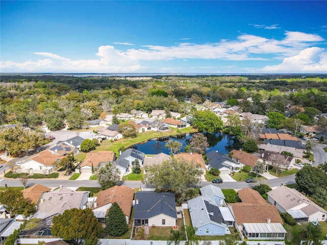 bird's eye view with a water view and a residential view