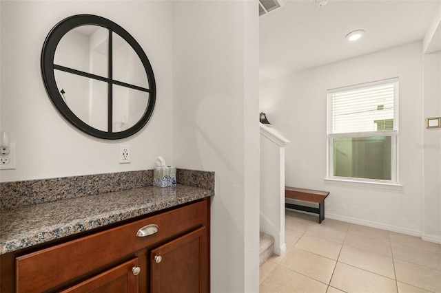 2817 Noble Crow Dr, Kissimmee, FL 34744 - bathroom with tile patterned floors, visible vents, baseboards, and vanity
