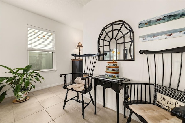2817 Noble Crow Dr, Kissimmee, FL 34744 - sitting room with baseboards and tile patterned flooring