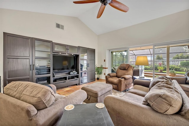 living room featuring light tile patterned floors, high vaulted ceiling, ceiling fan, and visible vents