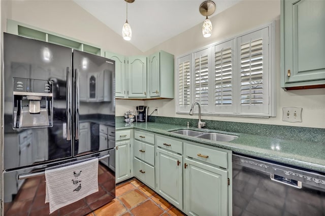 kitchen with a sink, vaulted ceiling, black appliances, pendant lighting, and green cabinetry