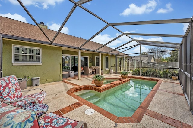 view of swimming pool featuring a fenced in pool, glass enclosure, and a patio area