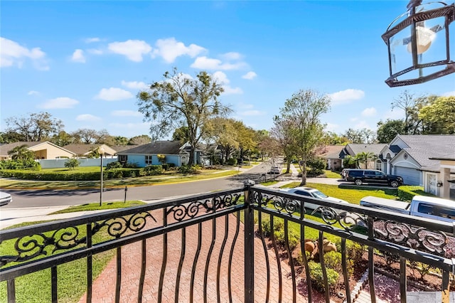 balcony featuring a residential view