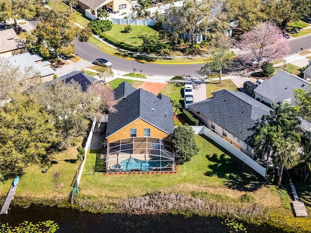 aerial view featuring a water view and a residential view