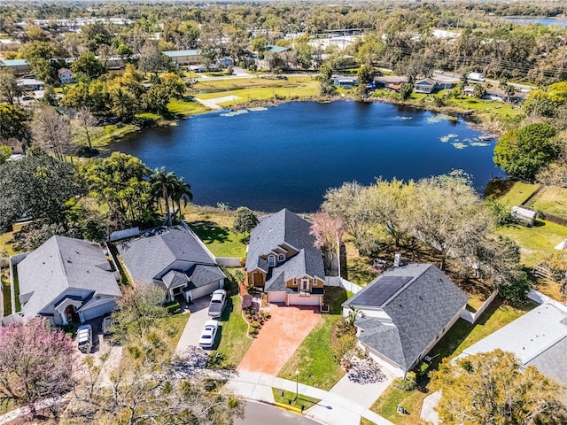 aerial view with a water view and a residential view