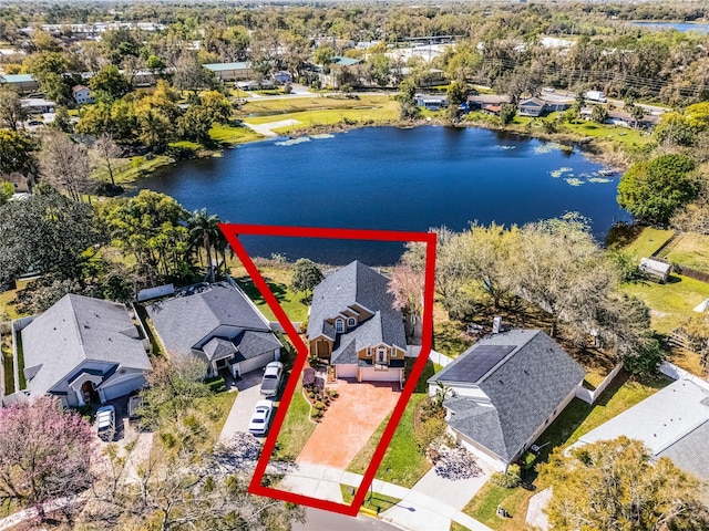 bird's eye view with a water view and a residential view