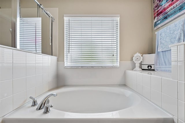 full bathroom with a garden tub