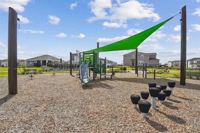 community playground featuring a residential view