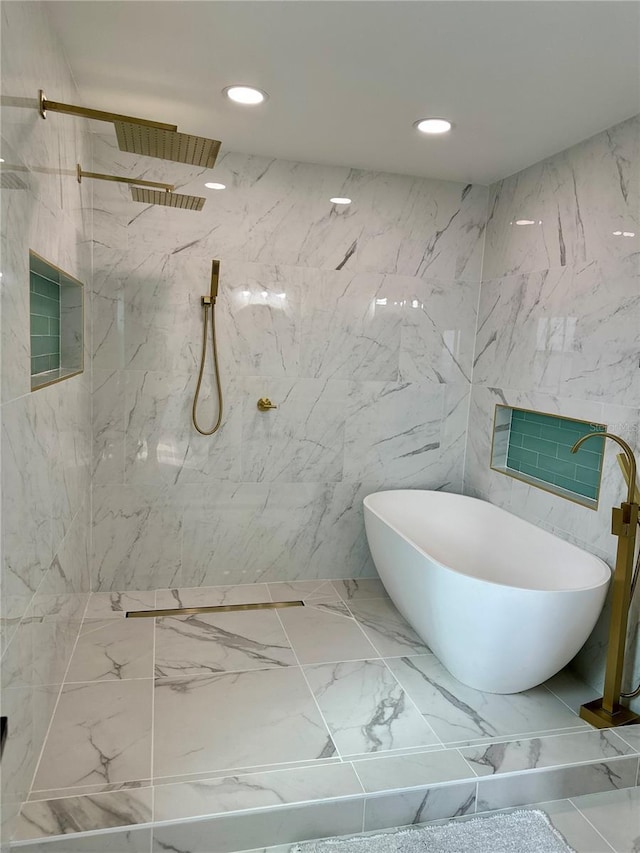 full bathroom featuring a marble finish shower, recessed lighting, marble finish floor, and a freestanding tub