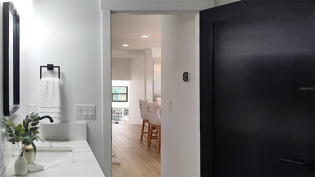 bathroom featuring wood finished floors