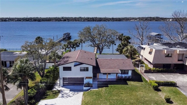 birds eye view of property featuring a water view