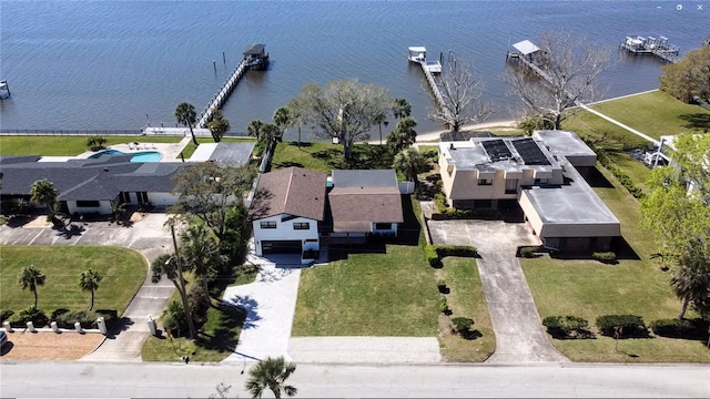 birds eye view of property featuring a water view