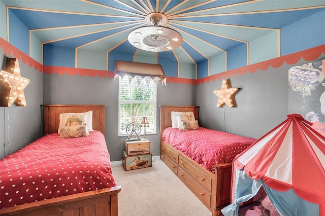 bedroom with carpet flooring and baseboards