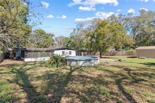 view of yard with a fenced backyard and a fenced in pool