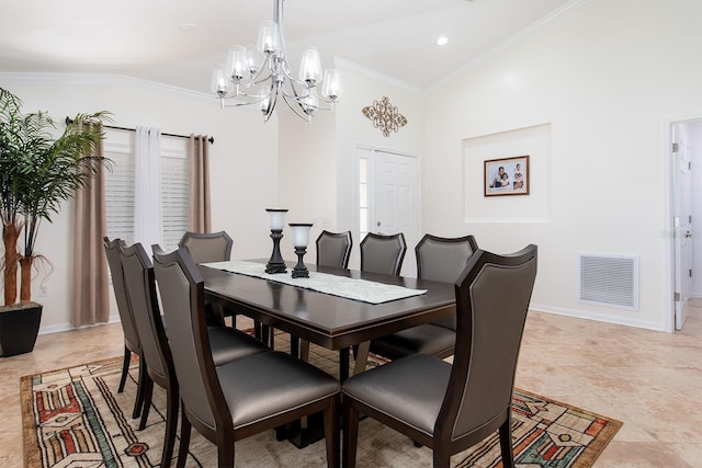 dining room featuring vaulted ceiling, visible vents, crown molding, and baseboards