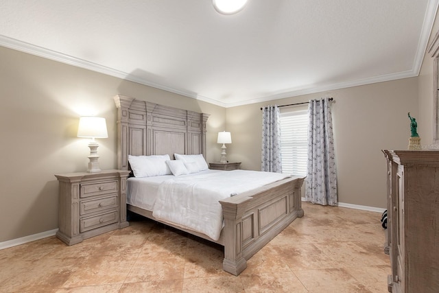 bedroom with baseboards and ornamental molding