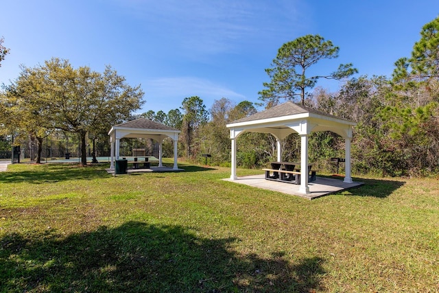 view of home's community featuring a lawn and a gazebo