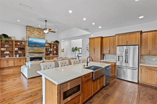 5500 State Road 33, Clermont, FL 34714 - kitchen with appliances with stainless steel finishes, light countertops, and a sink