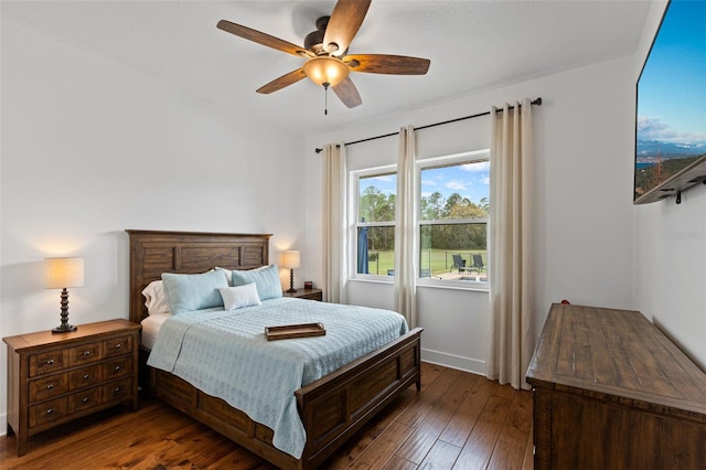 5500 State Road 33, Clermont, FL 34714 - bedroom with a ceiling fan, wood-type flooring, and baseboards