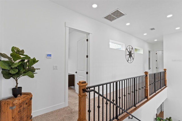 5500 State Road 33, Clermont, FL 34714 - hall featuring an upstairs landing, recessed lighting, visible vents, and carpet flooring