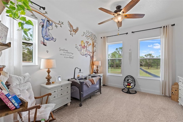 5500 State Road 33, Clermont, FL 34714 - sitting room with light carpet, baseboards, and a ceiling fan