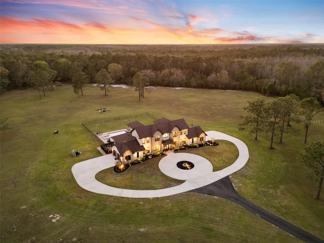 5500 State Road 33, Clermont, FL 34714 - aerial view at dusk with a rural view and a view of trees