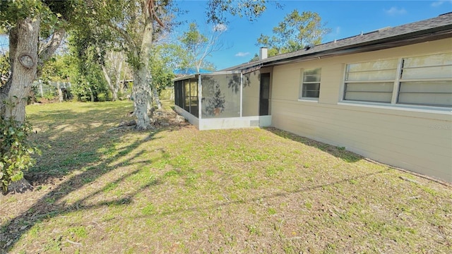 1420 Continental Dr, Daytona Beach, FL 32117 - view of green lawn featuring a sunroom