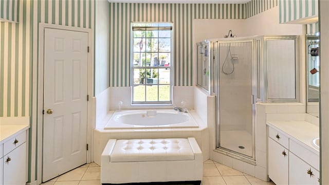 bathroom featuring a shower stall, wallpapered walls, and vanity