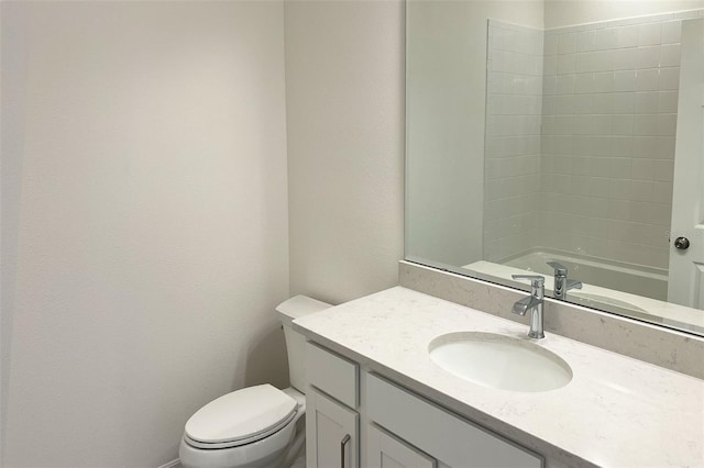 bathroom with toilet, a bathtub, a shower, and vanity