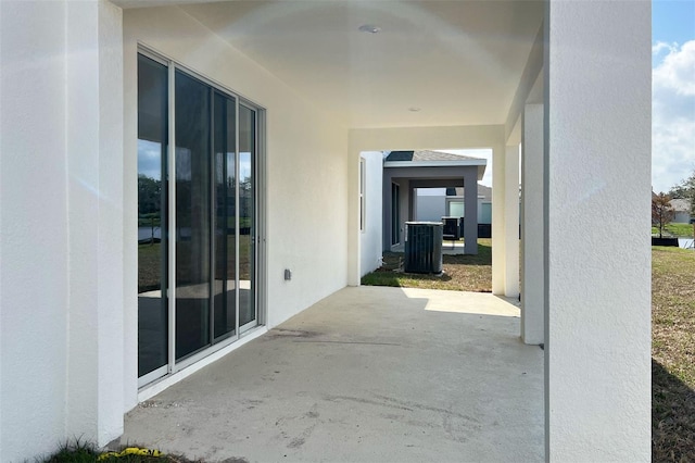 view of patio / terrace with central air condition unit