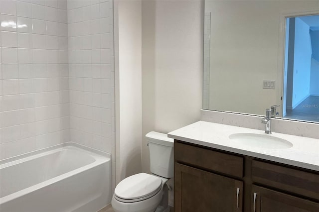 full bath featuring toilet, tub / shower combination, and vanity