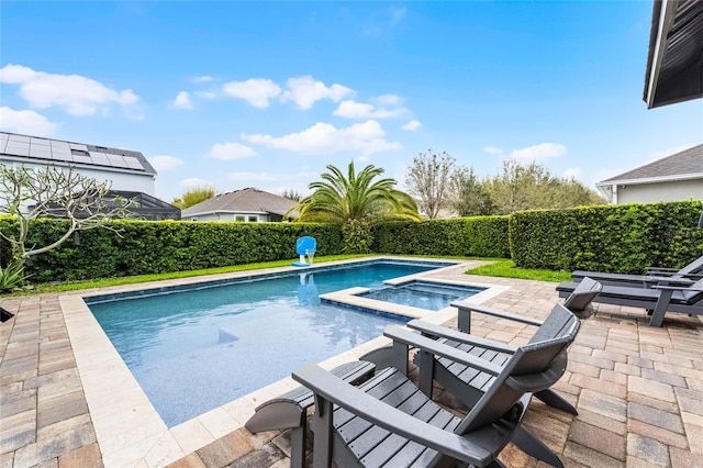 view of swimming pool with a fenced in pool and a patio