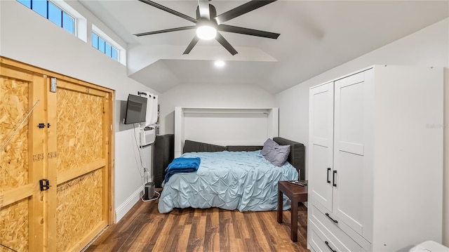 bedroom featuring lofted ceiling, dark wood-type flooring, and a ceiling fan