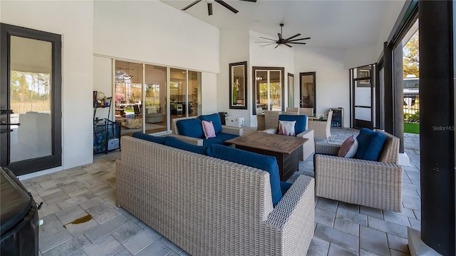 view of patio with ceiling fan and outdoor lounge area