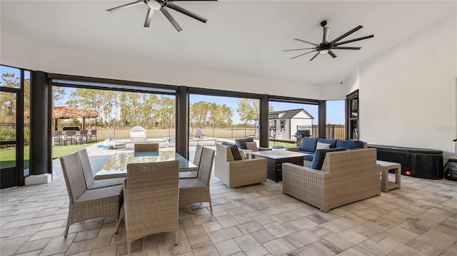 sunroom / solarium featuring a healthy amount of sunlight