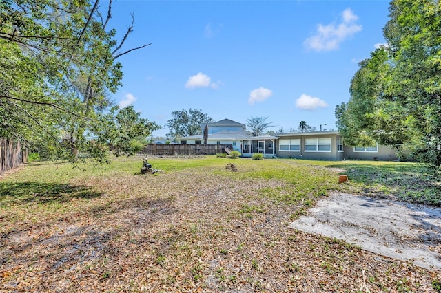 view of yard with fence