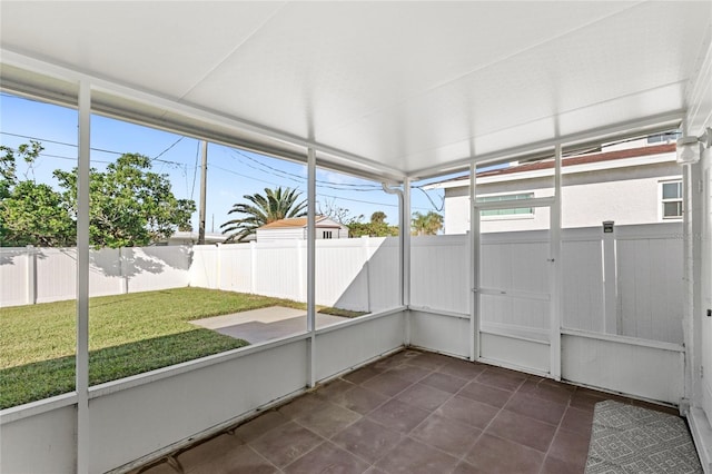 unfurnished sunroom featuring plenty of natural light