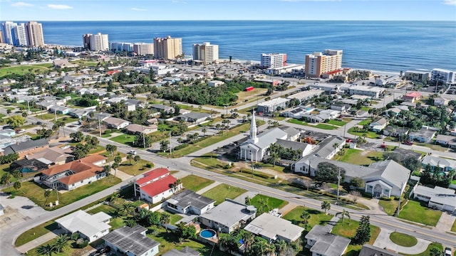 drone / aerial view with a view of city and a water view