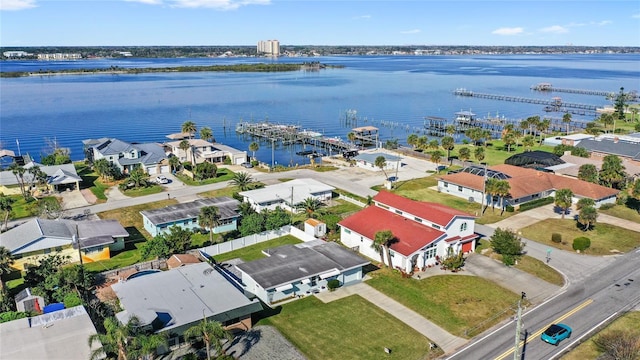 aerial view featuring a residential view and a water view