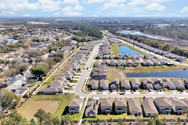 aerial view featuring a residential view and a water view