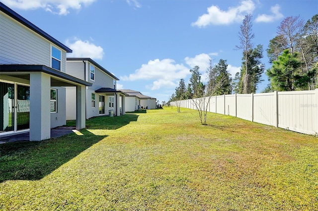 view of yard with fence