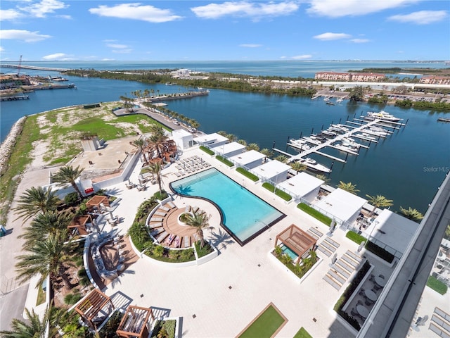 birds eye view of property with a water view