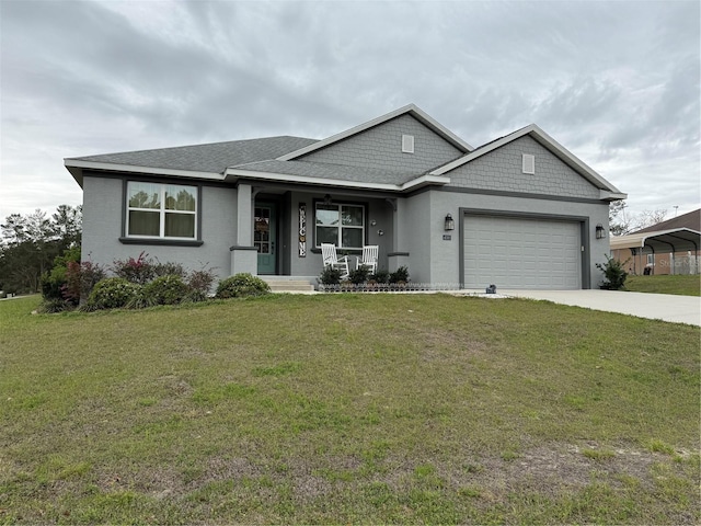 view of front of home with a shingled roof, covered porch, concrete driveway, a front yard, and a garage