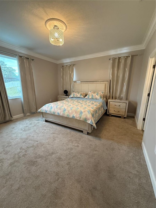 unfurnished bedroom featuring baseboards, carpet, and crown molding